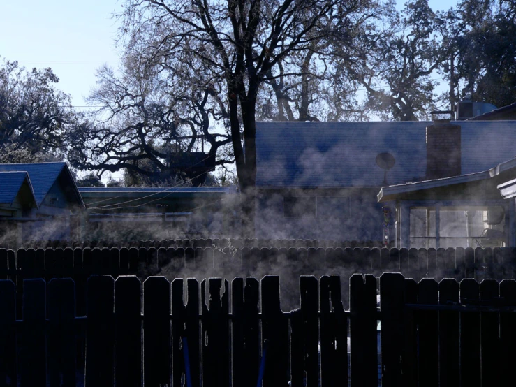 the back end of a fence with mist coming out of it