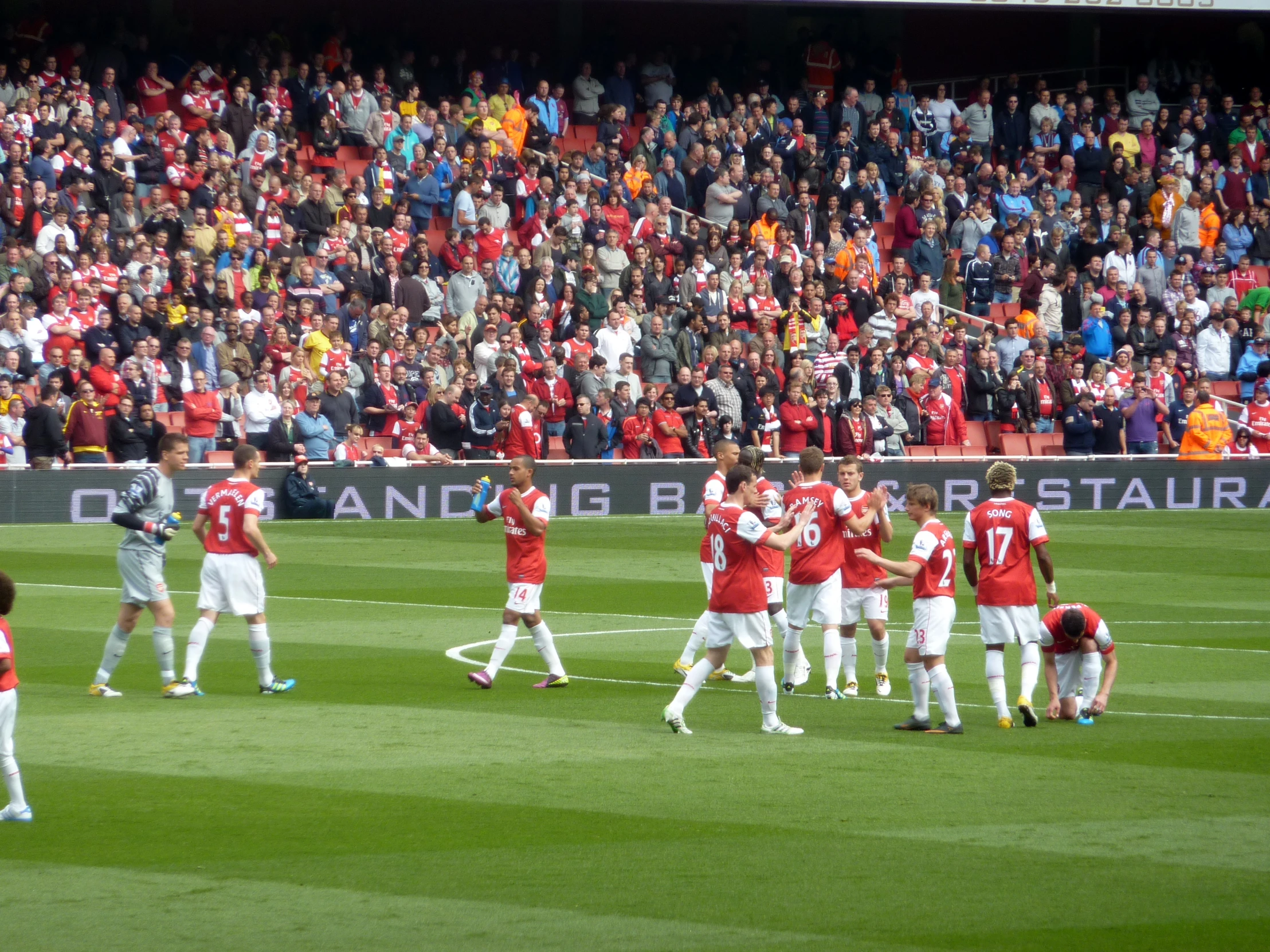 a soccer game being played in front of an audience