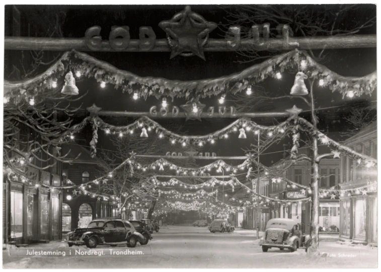 old fashioned street decorated with holiday lights