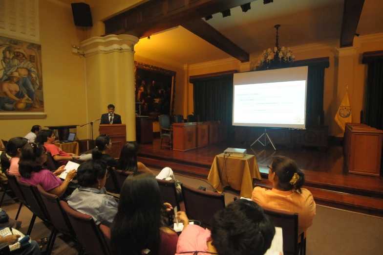 a seminar where a speaker is giving a lecture to students