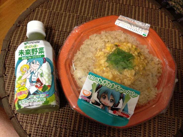 a bowl of rice and water sitting on a table