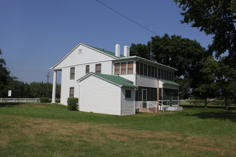 the back of the house is painted white