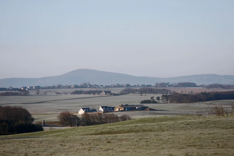 a view of a scenic view of a mountain town and other small houses