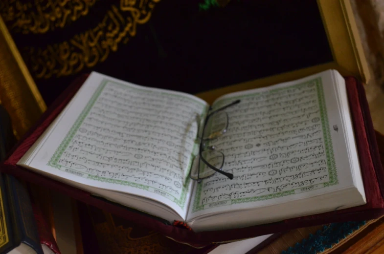 an open arabic book with arabic writing on it