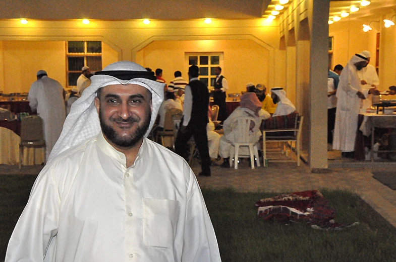 a man standing in front of a group of people