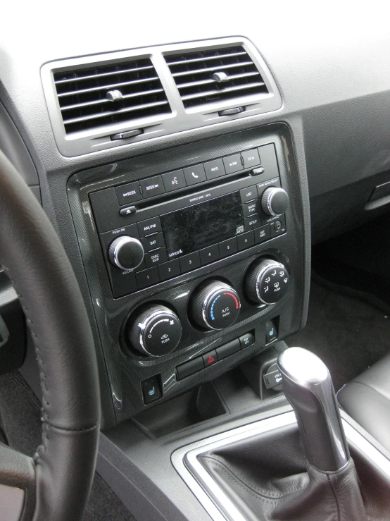dashboard s of the car with dashboard and radio