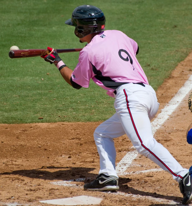 a baseball player getting ready to hit a ball