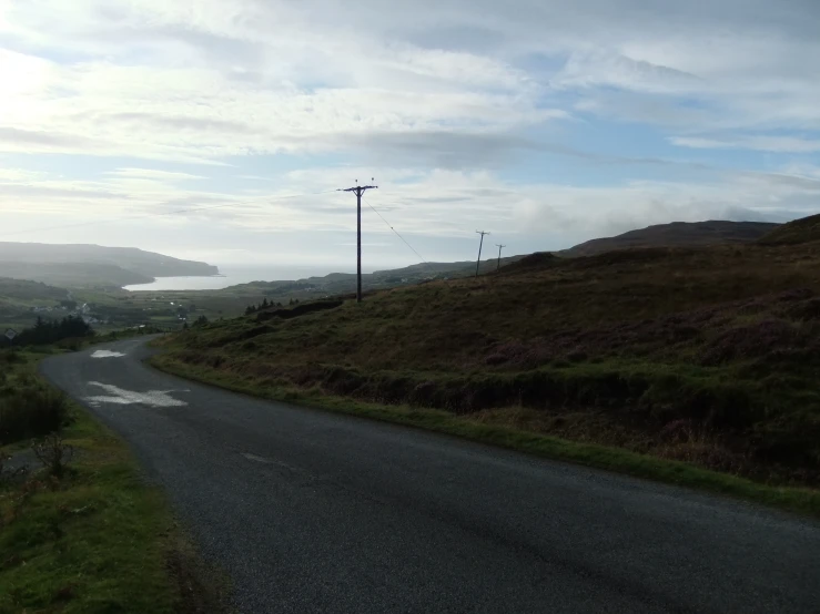 a view of the road on a cloudy day