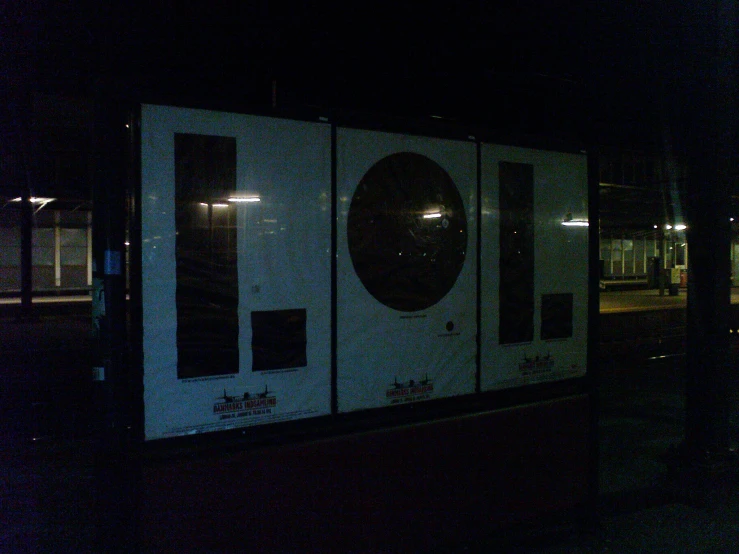 an outside area of an asian train station at night