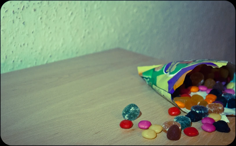 a bunch of candy in a bag on a table