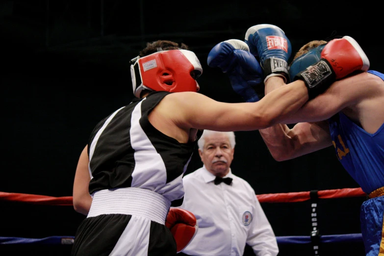 an image of two fighters fighting in a ring