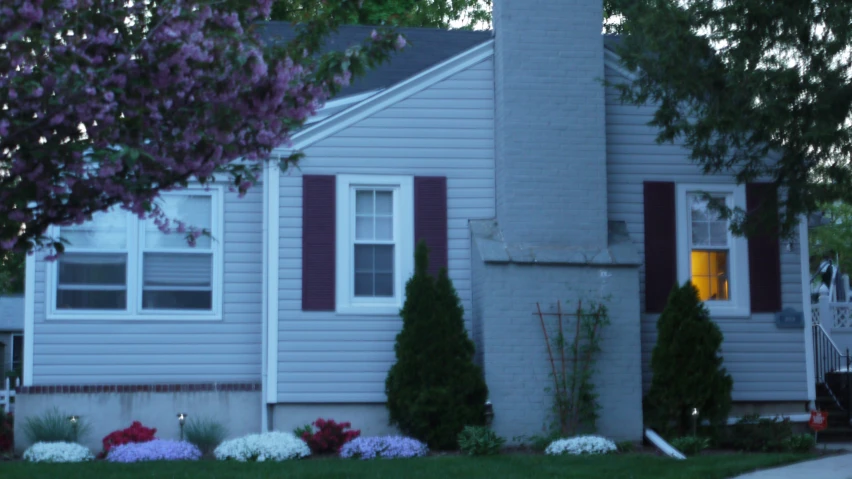 this is a house with a tall chimney