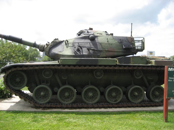 the large army tank is on display in front of the museum