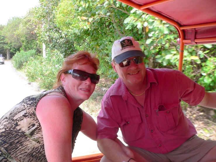 man and woman taking a selfie on a sunny day