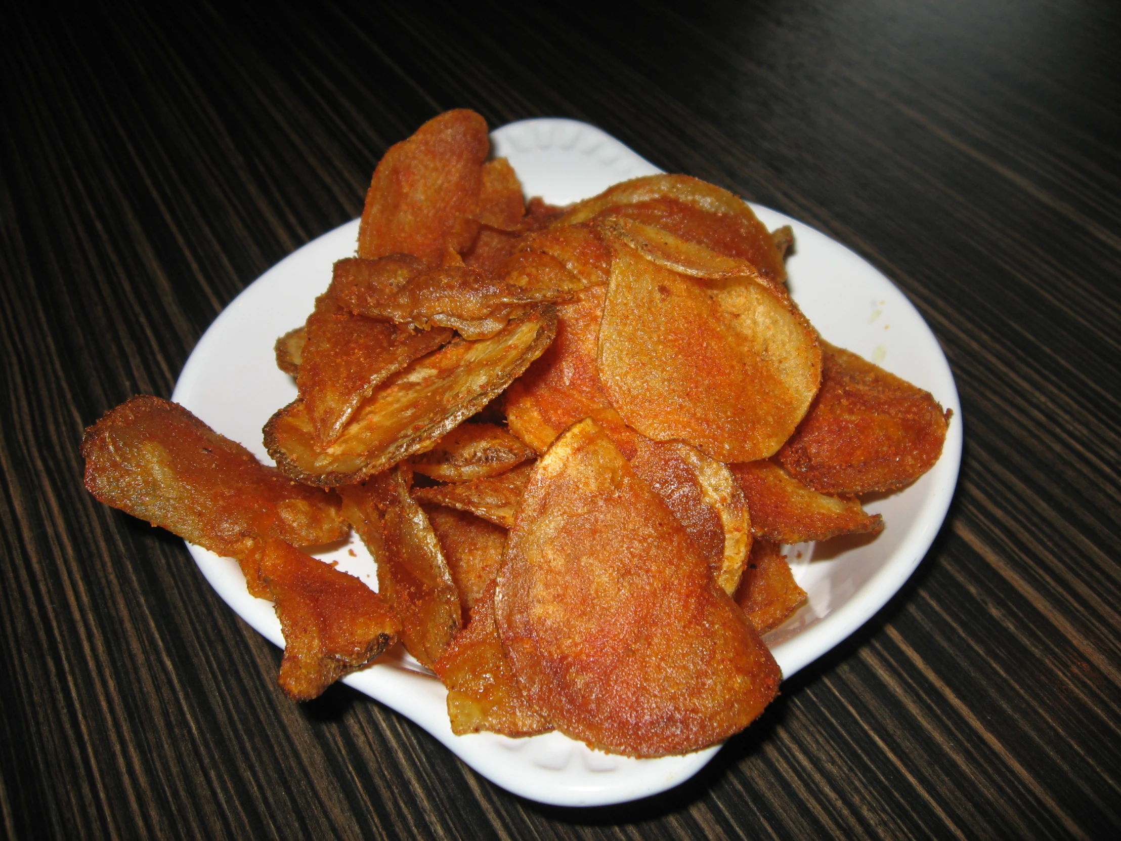 cooked food items sit on a white plate