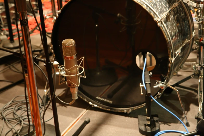 the drum is surrounded by other electronic equipment