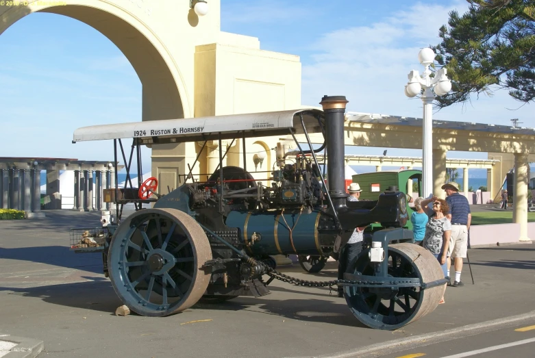 a tractor is on display on a street