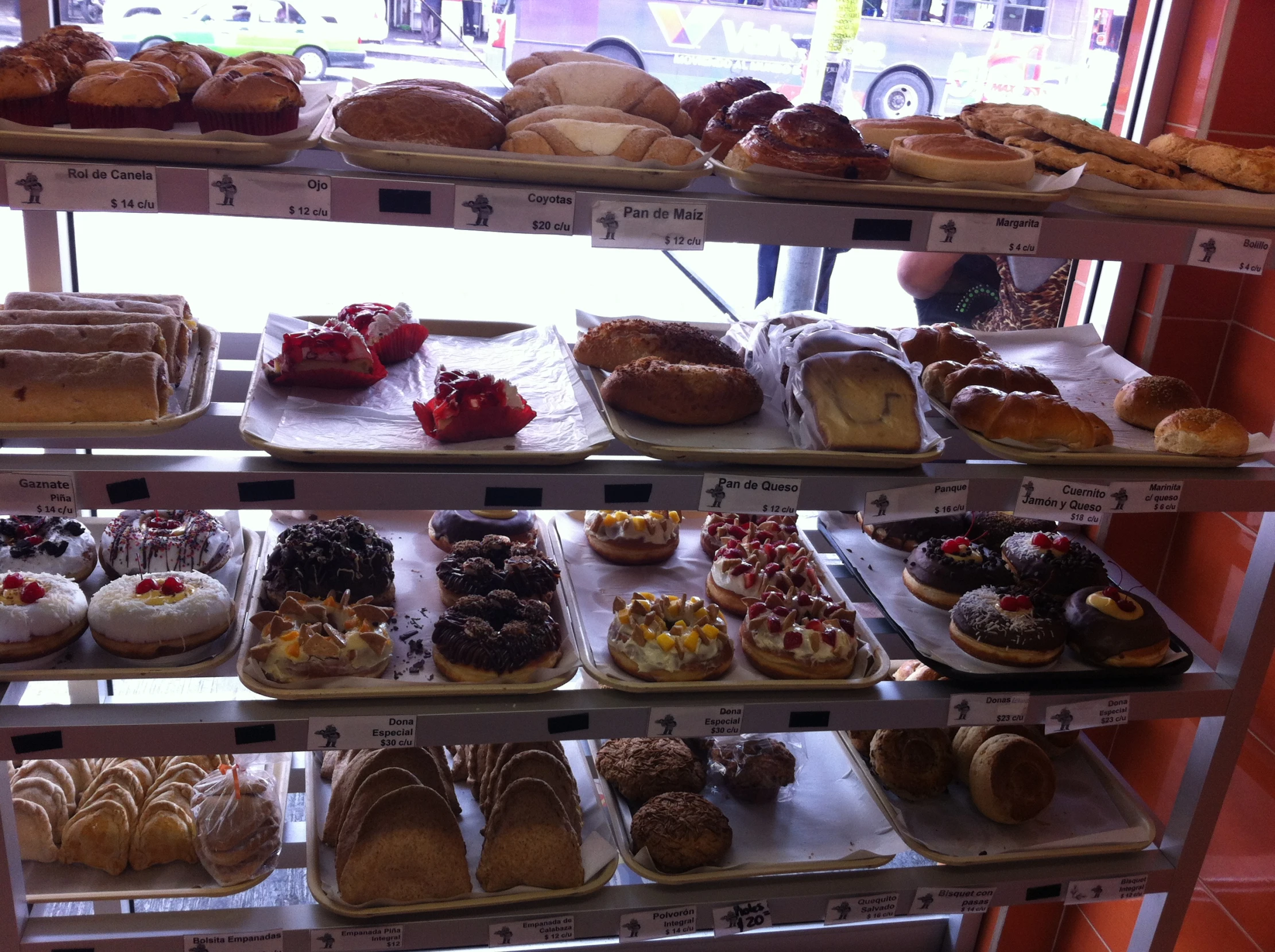 a bunch of doughnuts that are in a store