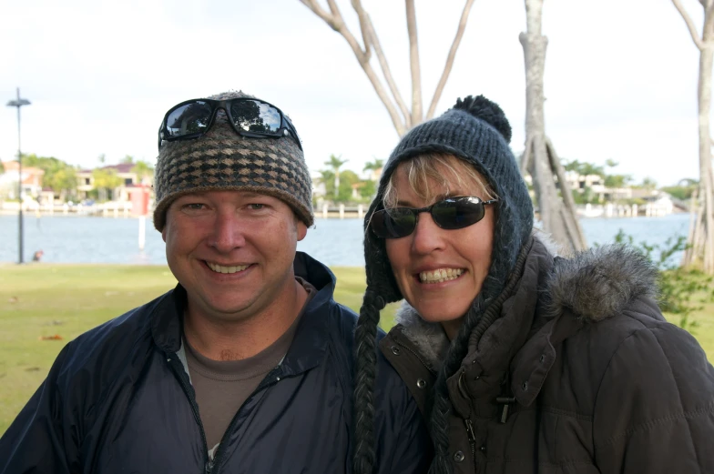 the man and woman are standing close to each other