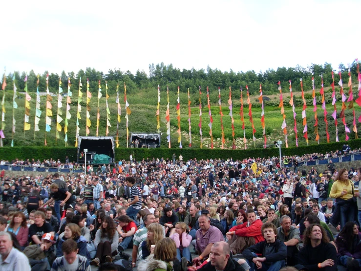 the concert has a large crowd full of people