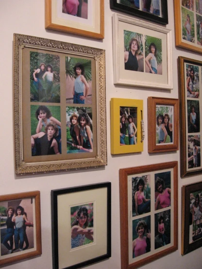 various frames with images of people on the wall
