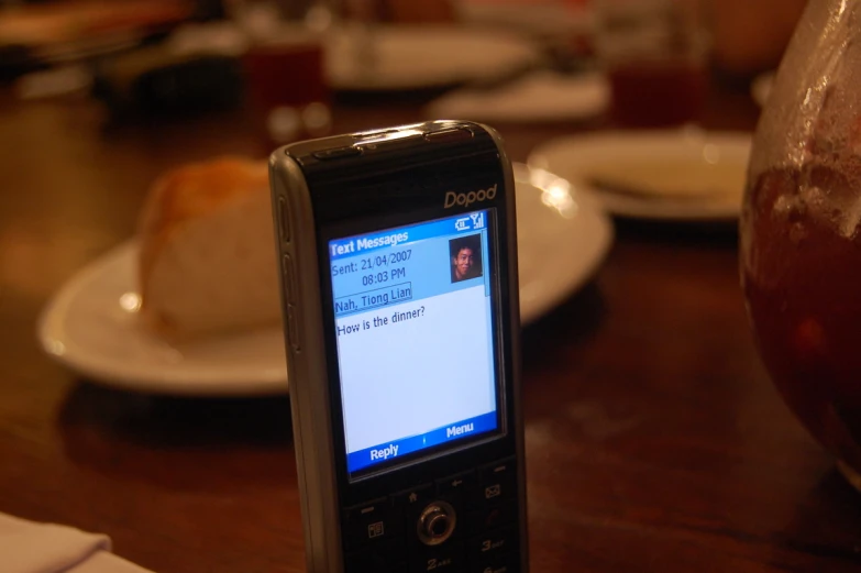 a cell phone sitting on top of a table