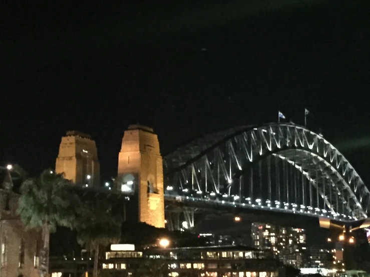 an image of sydney bridge at night time