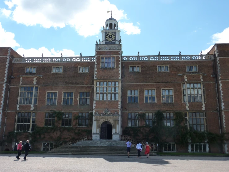 a building with people standing outside it