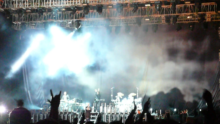 large group of people sitting at a concert