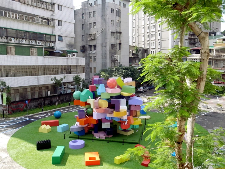 an area with many lawn furniture made out of boxes