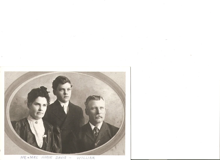 an old picture shows three people in formal dress