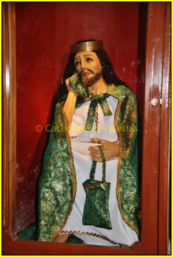 jesus in a door wearing a crown and standing next to a purse