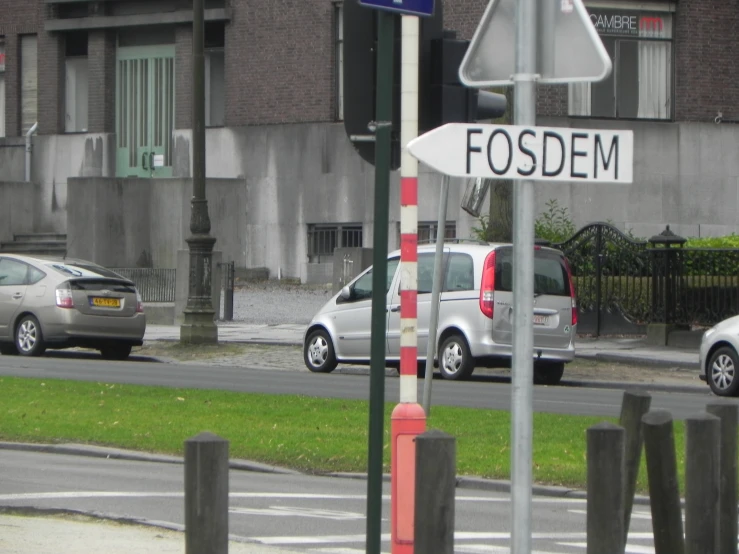 an intersection with a street sign that reads foster