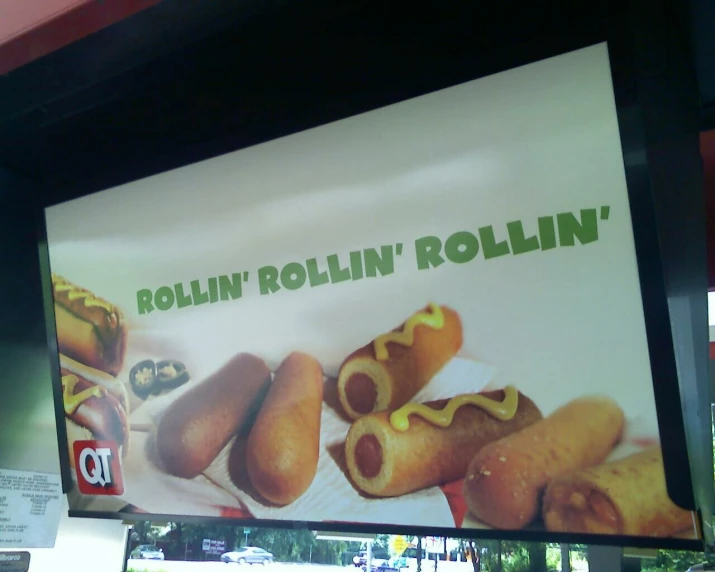 a billboard for a store advertising rollin'roln '