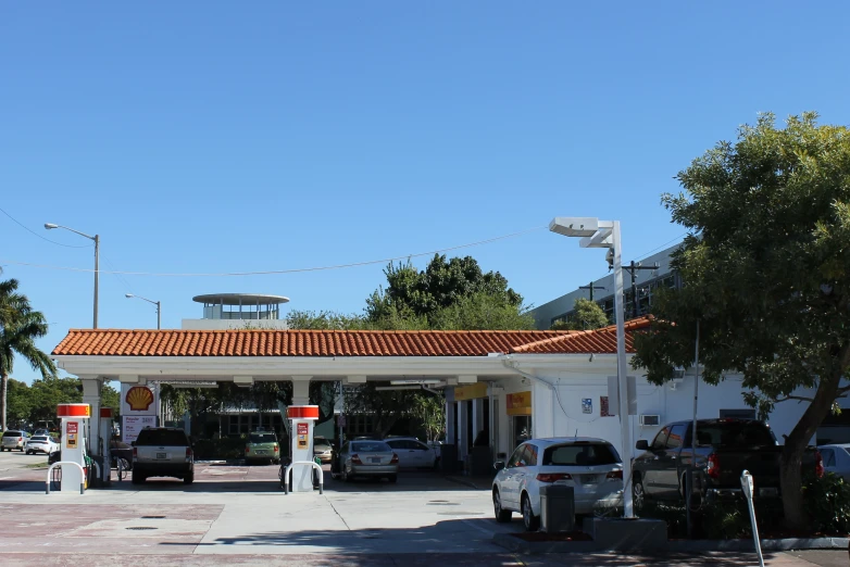 a gas station with an outside store