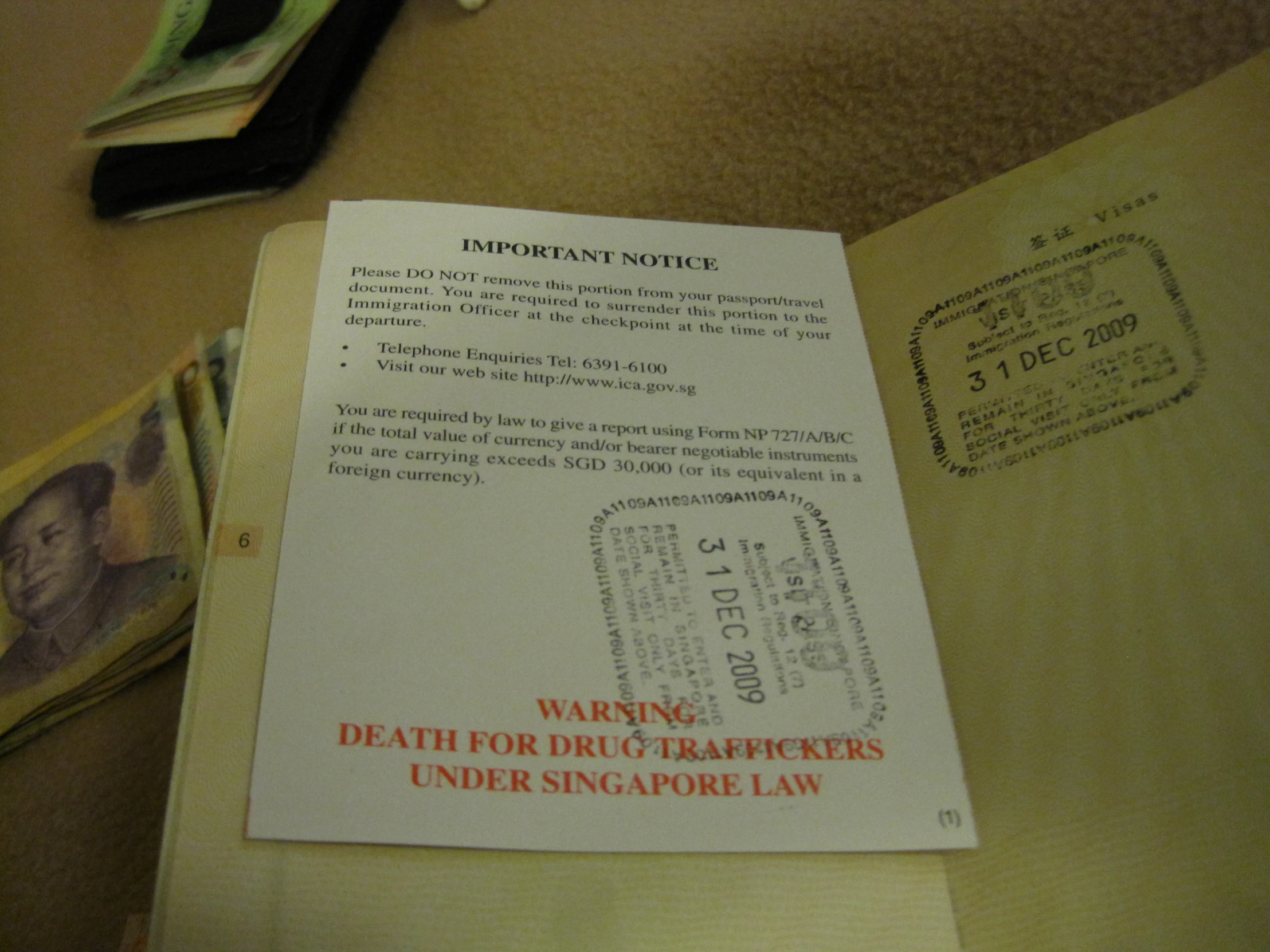 an open envelope with stamps that read death for drug daughters under singapore law