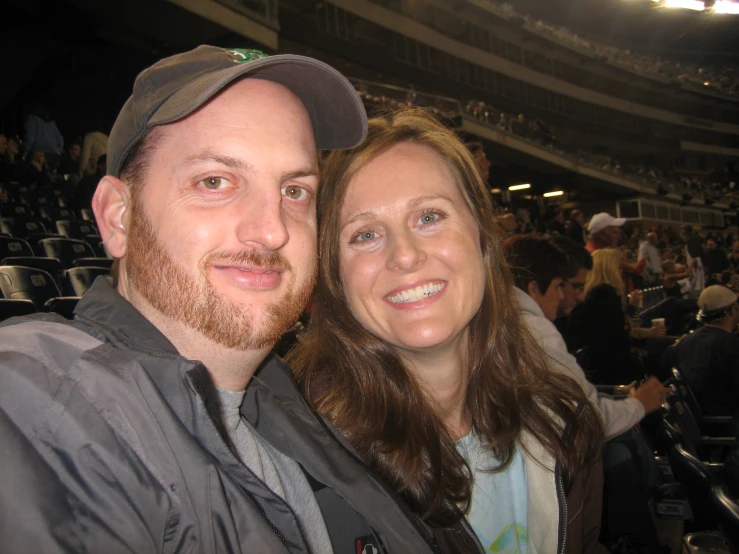 a couple at an event posing for the camera