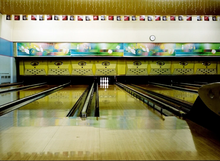 a bowling alley with many bowling pins