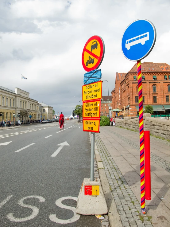 a couple of different types of signs on the side of a road