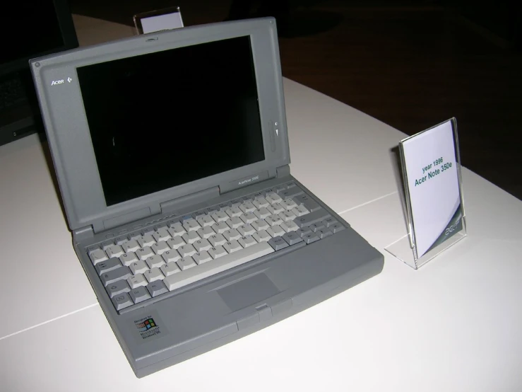 a laptop computer sitting on a table