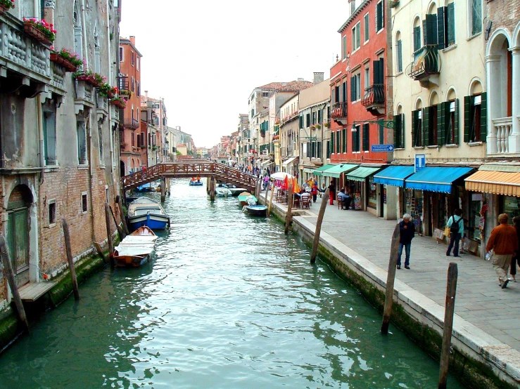 a canal running through a city with small buildings