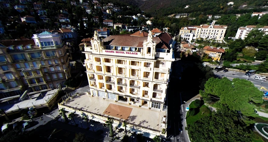 an aerial view of a city block on a sunny day