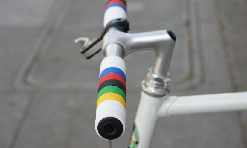 a bike handle with colorful bars on it's rear