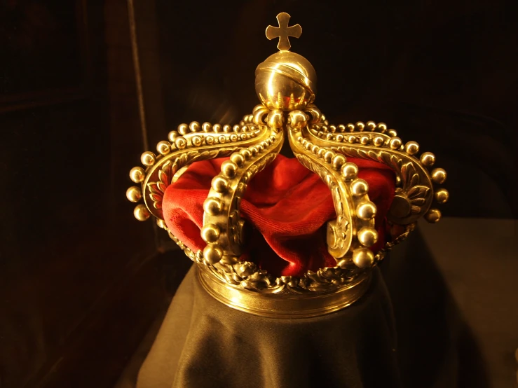 a crown that is on a black cloth