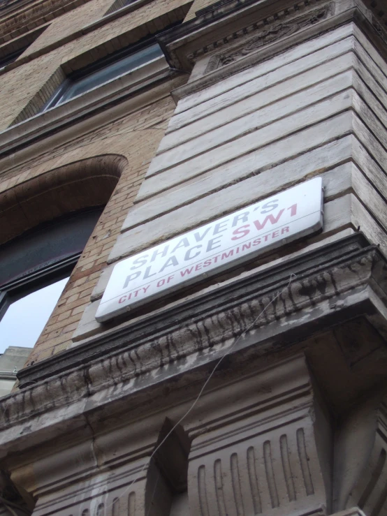 an old stone building with a sign that says shineew law