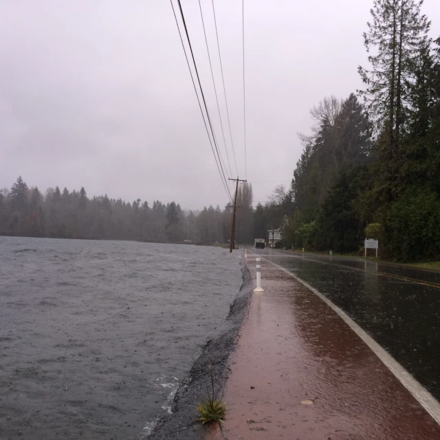 a flooded roadway on a rainy day