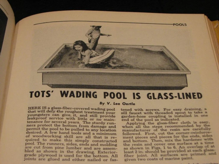 a magazine with an image of a woman in a pool
