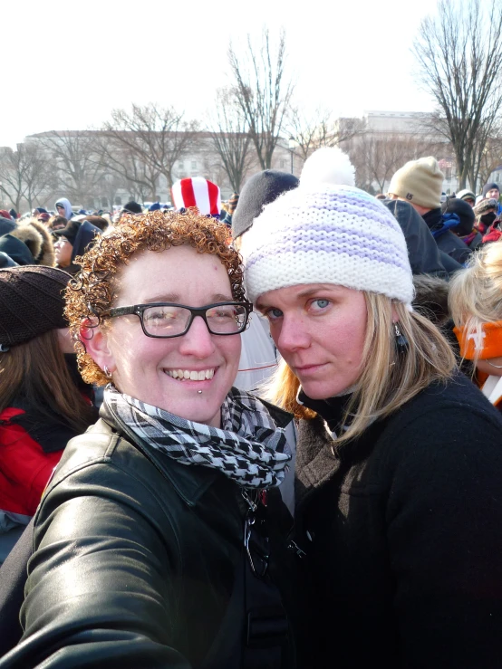 two women taking a selfie while dressed in snow gear