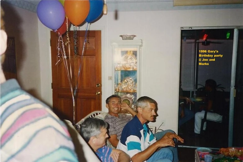 a group of people sitting around a table