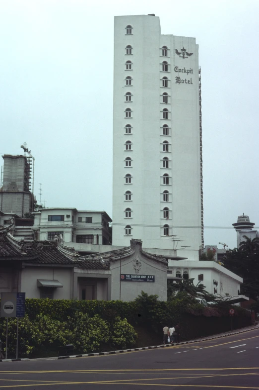 buildings surrounding the city on a foggy day